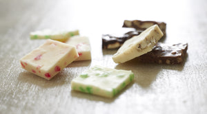 Peppermint Bark is made with green peppermint pieces combined with white chocolate.